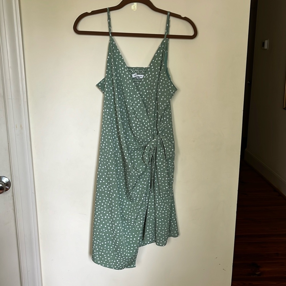 Green and white polkadot wrap dress with tank straps